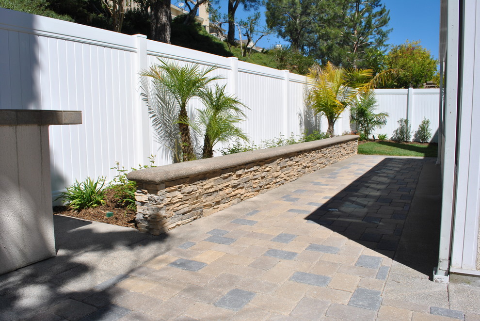 Paver Patio with Stone Veneer Seat Wall/Planter Traditional Patio