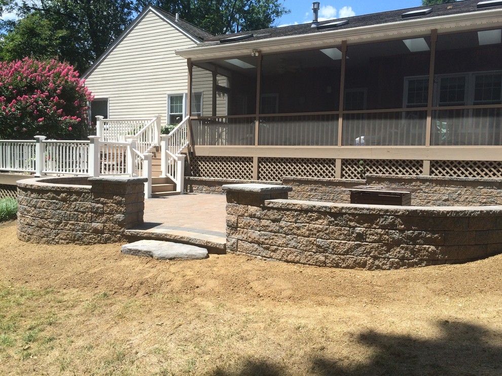 Patio - mid-sized rustic backyard concrete paver patio idea in Wilmington with no cover
