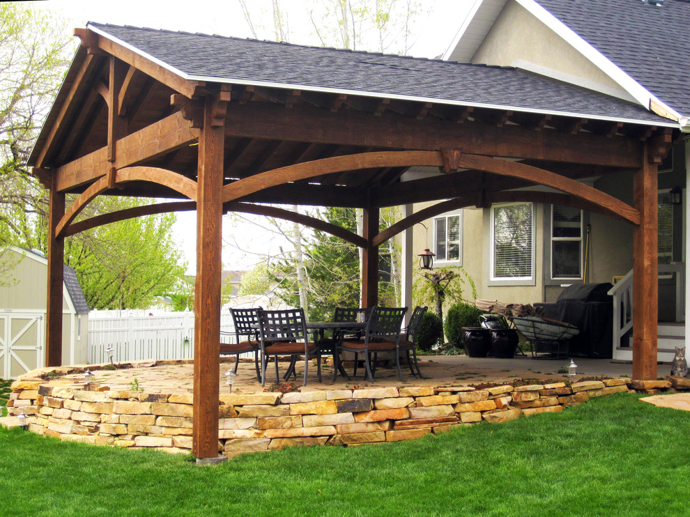 Large traditional back patio in Salt Lake City with a gazebo.
