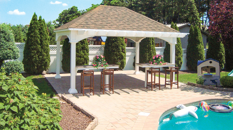Inspiration for a mid-sized timeless backyard brick patio remodel in Philadelphia with a gazebo