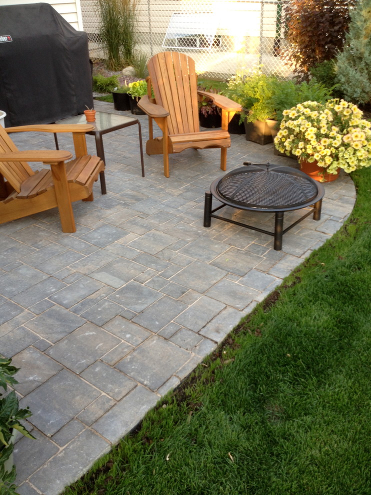 Paving stone patio construction Traditional Patio Calgary by