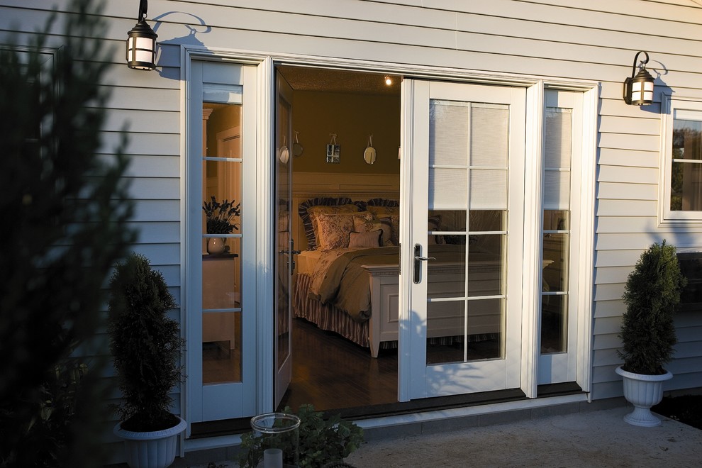 Pella® Designer Series® ENERGY STAR®qualified hinged patio doors Traditional Patio Cedar