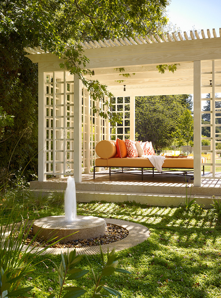 Inspiration for a classic patio in San Francisco with tiled flooring and a pergola.