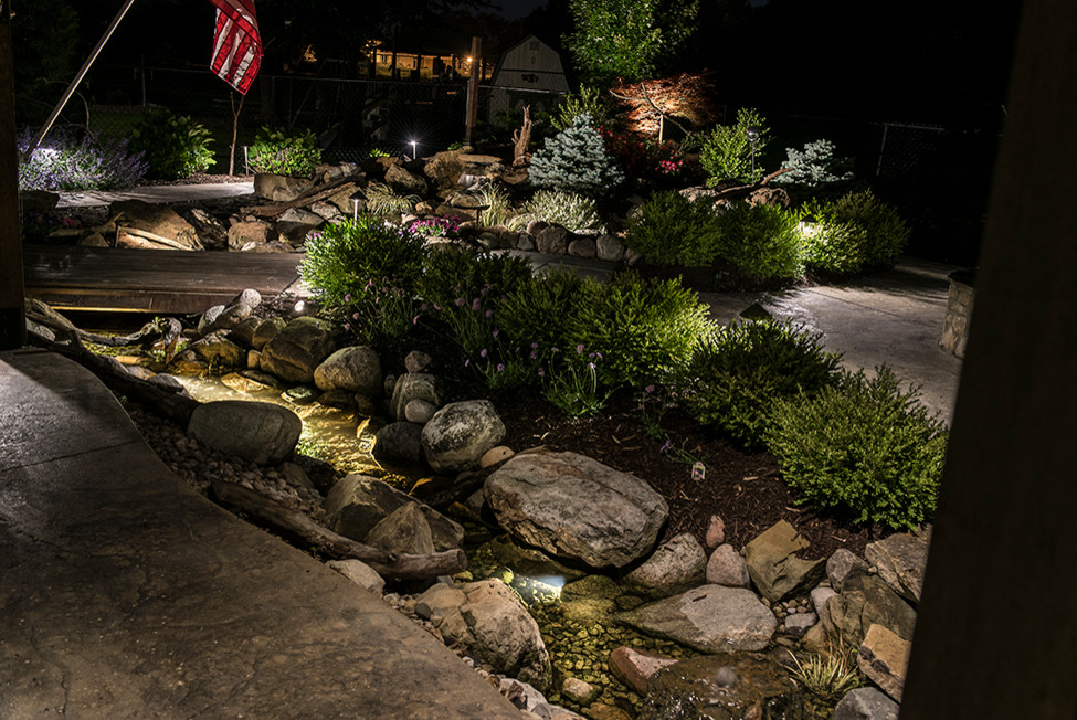 Pergola and waterfalls Traditional Garden Indianapolis by