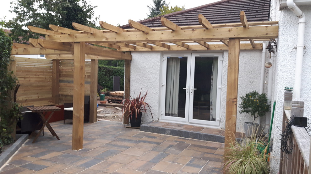 Pergola over patio Contemporary Patio Glasgow by G J Allison