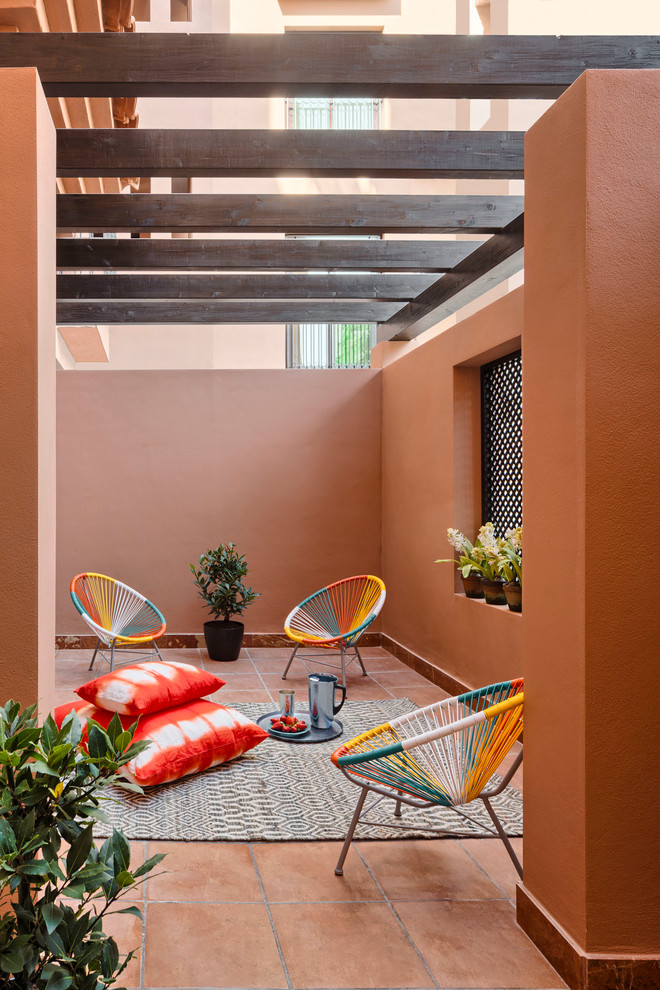 Photo of a bohemian patio in Malaga.