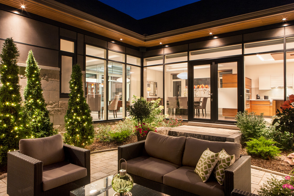 Design ideas for a contemporary patio in Ottawa.