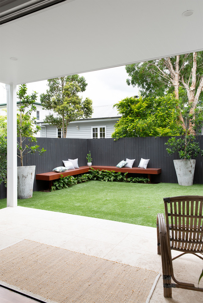 This is an example of an eclectic patio in Brisbane.