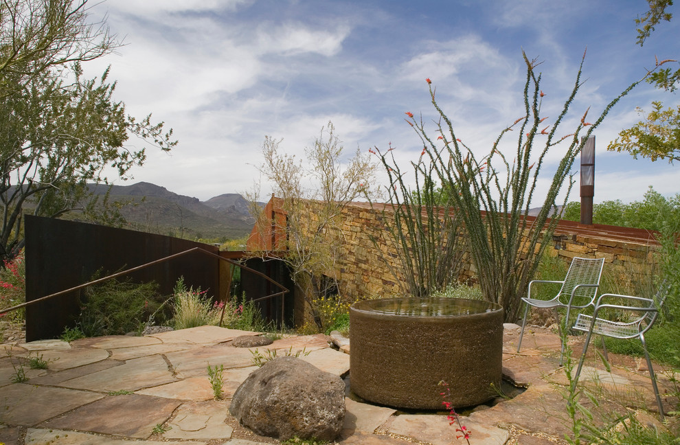 Photo of a patio in Phoenix with a water feature.