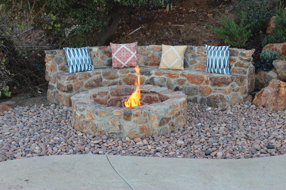 Design ideas for a traditional patio in San Diego with a fire feature.
