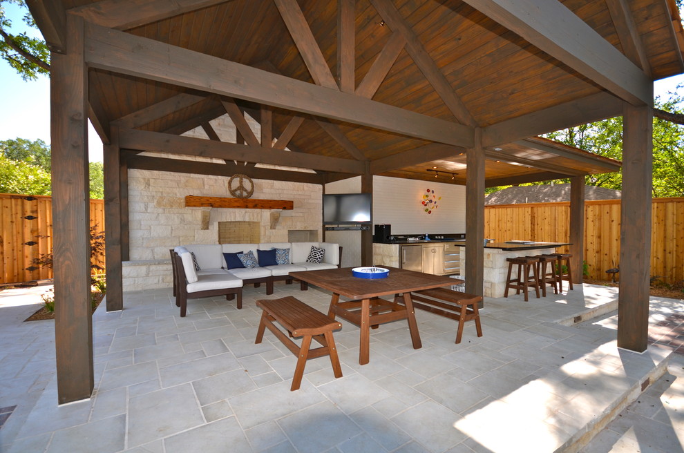 Inspiration for a medium sized classic back patio in Austin with an outdoor kitchen, concrete paving and a pergola.