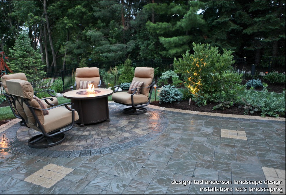 Patio - contemporary backyard concrete paver patio idea in Minneapolis with a fire pit