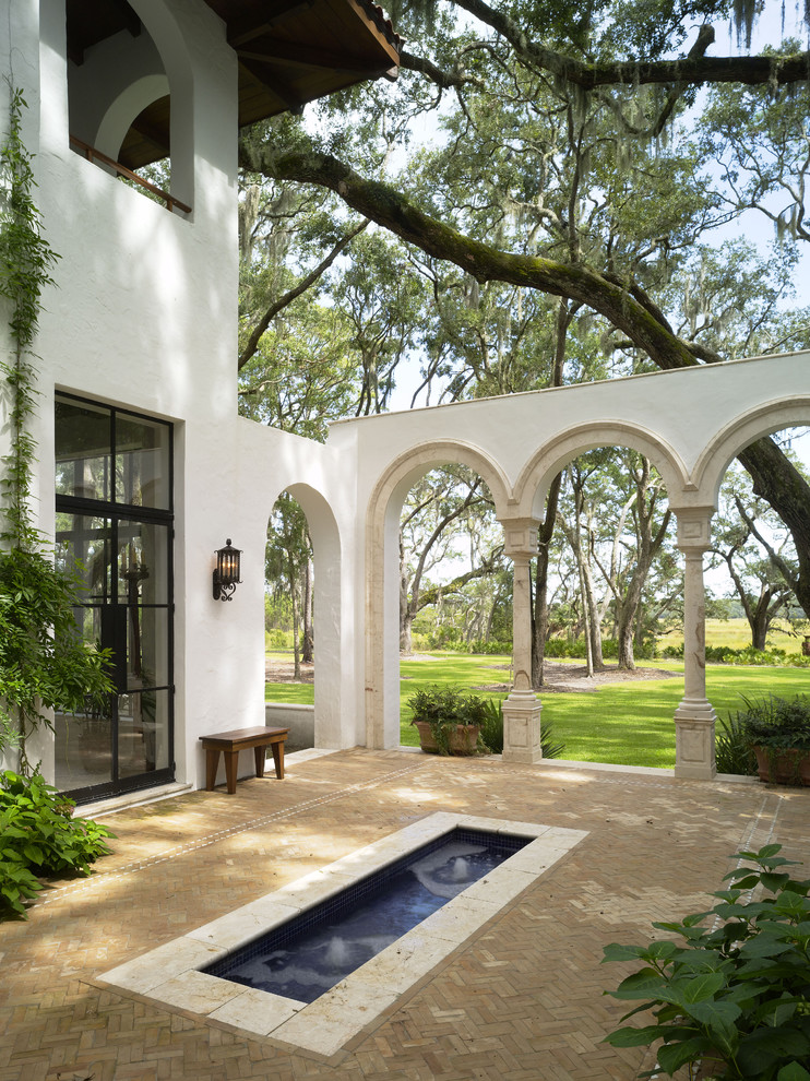 Patio fountain - mediterranean patio fountain idea in Atlanta