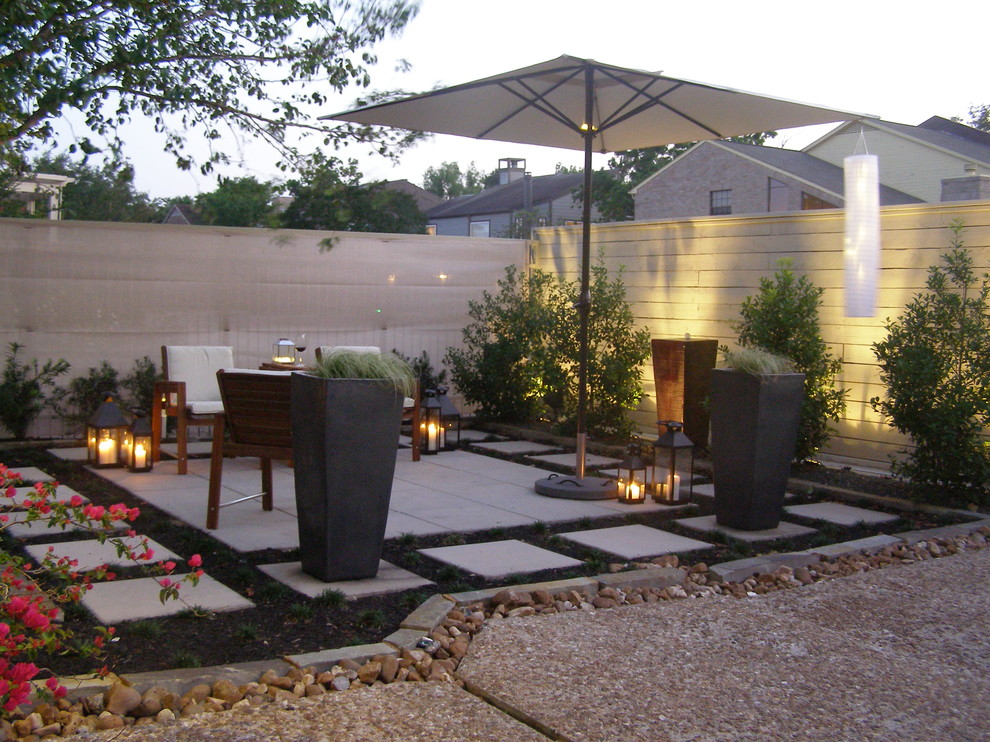 Inspiration for a contemporary patio remodel in Houston with no cover