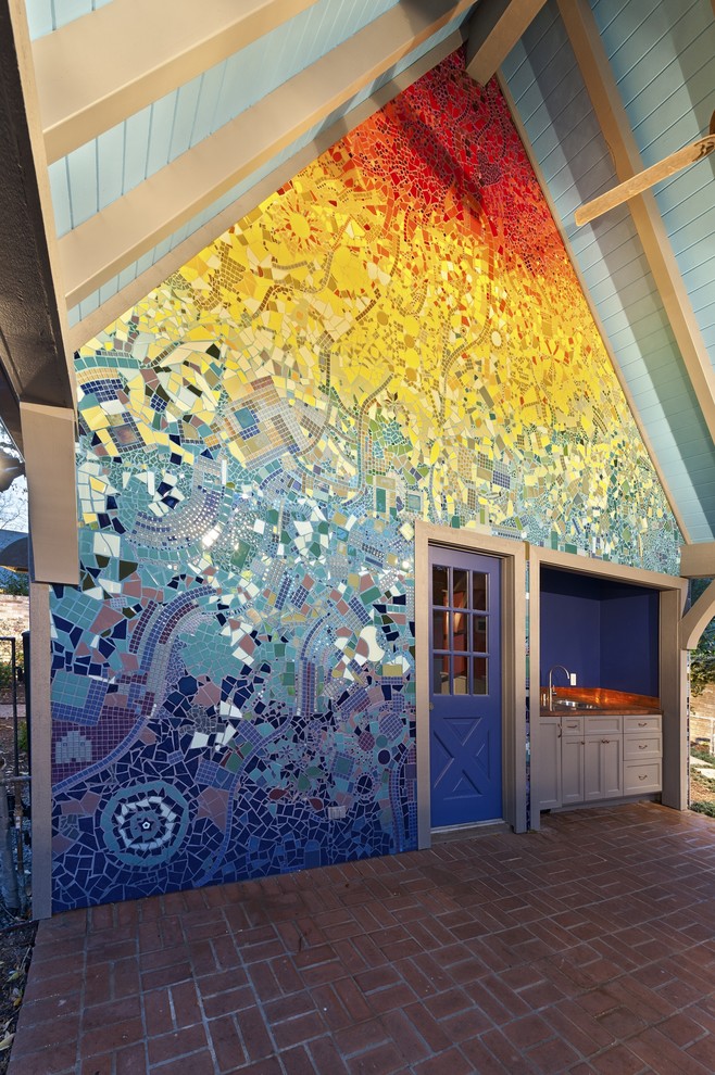 Inspiration for a large eclectic brick patio remodel in Houston