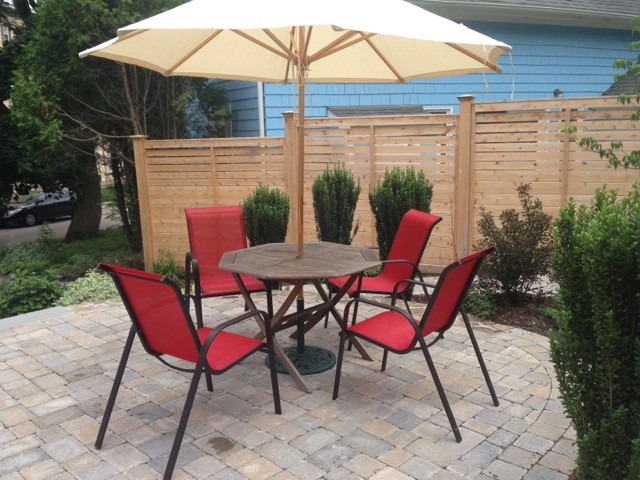 Example of a transitional patio design in Boston