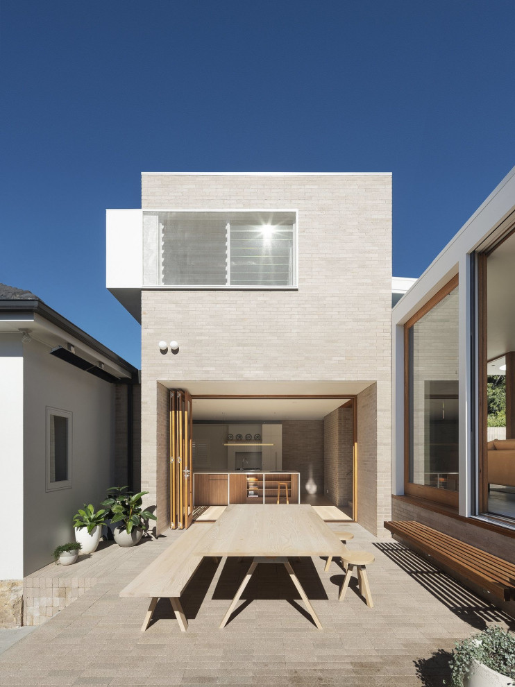 Foto di un patio o portico minimalista di medie dimensioni e dietro casa con nessuna copertura