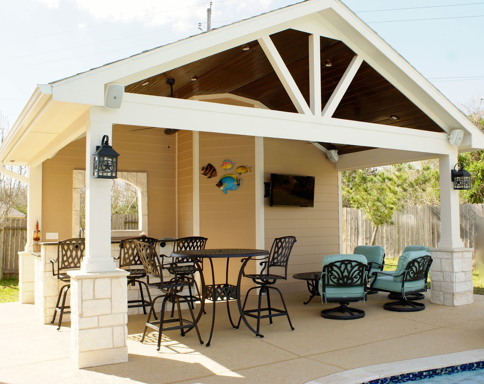 Inspiration for a coastal backyard patio remodel in Houston