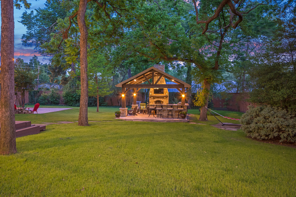 Inspiration for a medium sized rustic back patio in Houston with an outdoor kitchen, tiled flooring and a gazebo.