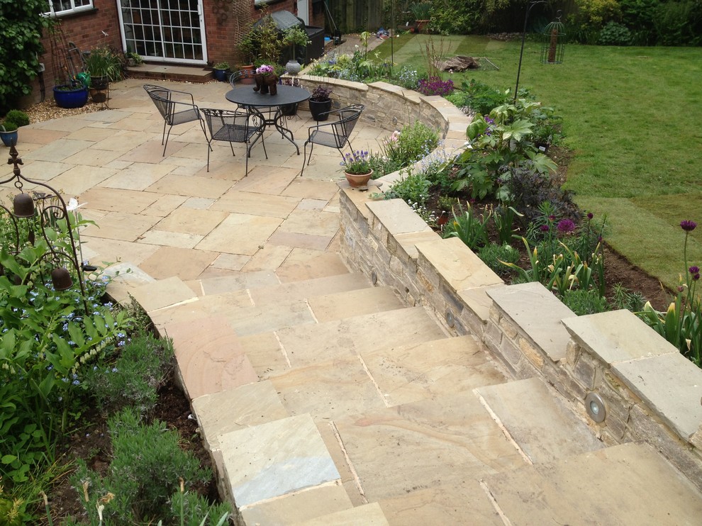 This is an example of a traditional patio in Devon.