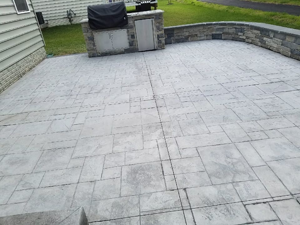 R Stamped Concrete Patio, Seating wall with flagstone caps and dropped