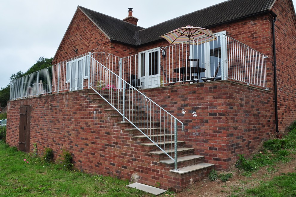 Railings and gate for raised patio area. Contemporary Patio Other
