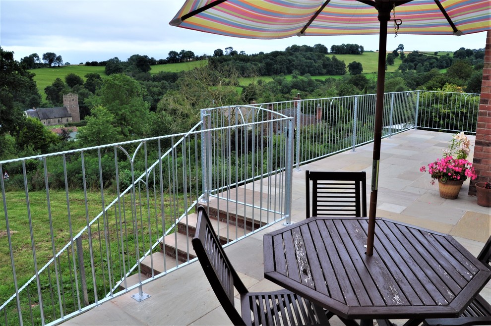 Railings and gate for raised patio area. Contemporary Patio Other
