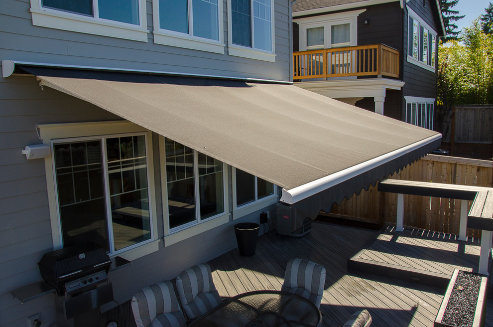 Rainier Shade Retractable Awning over Patio in Kirkland Traditional