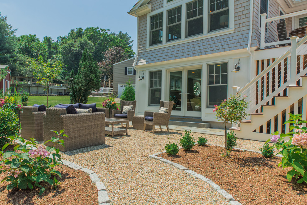 Inspiration for a medium sized coastal back patio in Bridgeport with gravel.