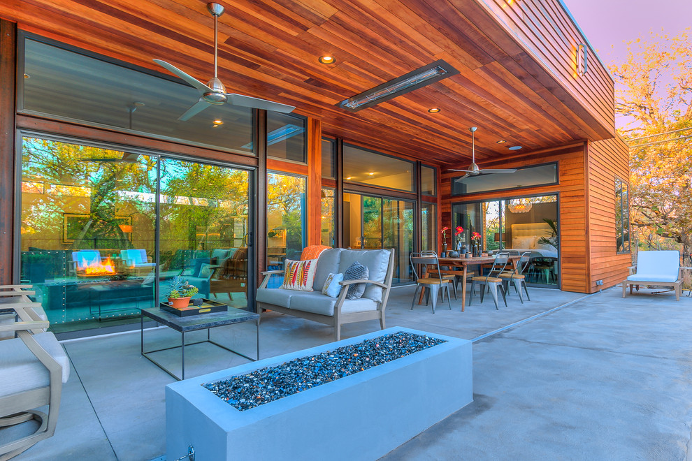 This is an example of a contemporary back patio in Oklahoma City.