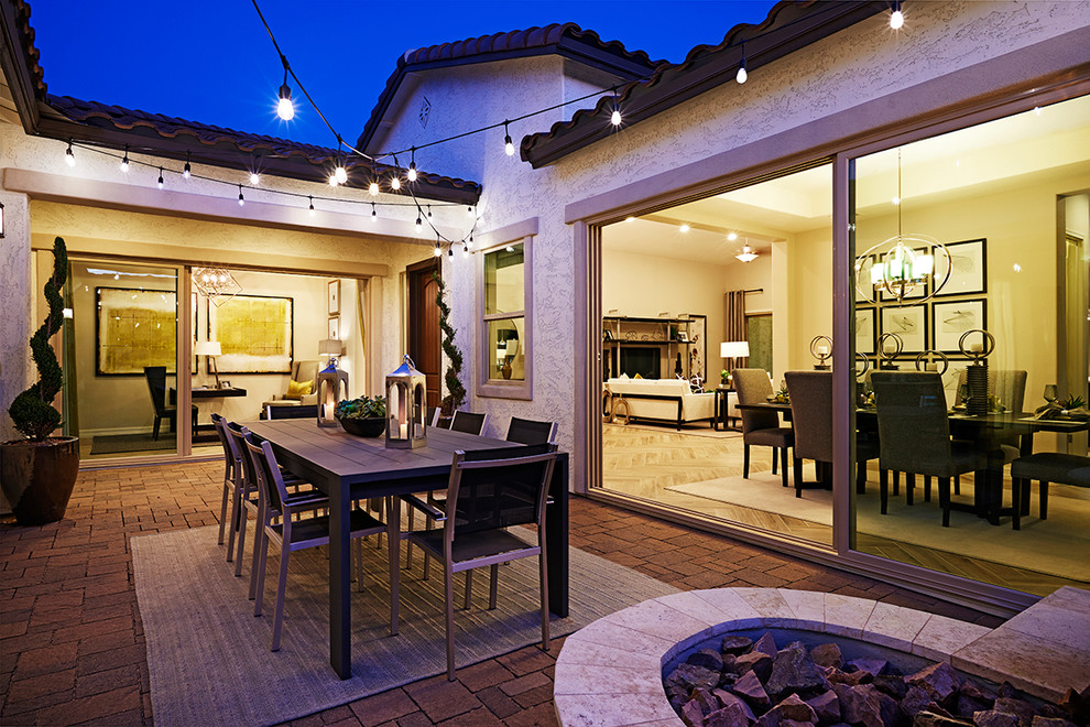 Inspiration for a contemporary backyard patio remodel in Denver