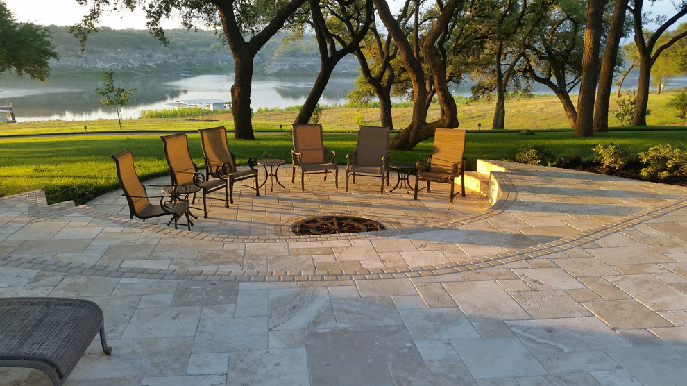 Mid-sized transitional backyard tile patio photo in Orlando with a fire pit and no cover
