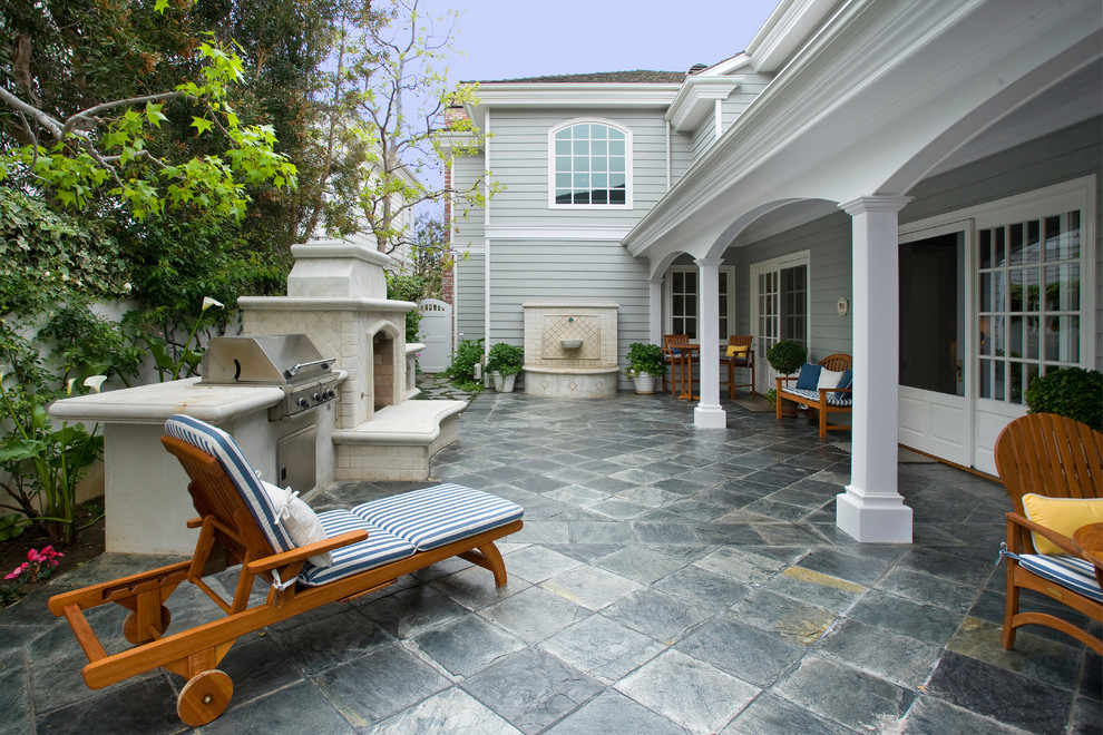 This is an example of a classic patio in Orange County with a bbq area.