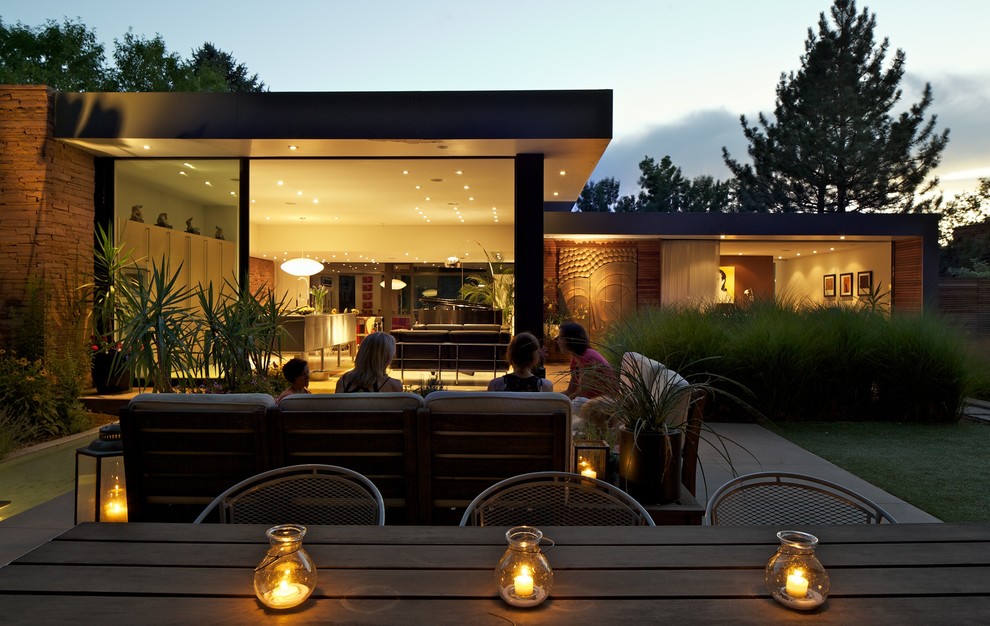 Inspiration for a mid-century modern patio remodel in Denver