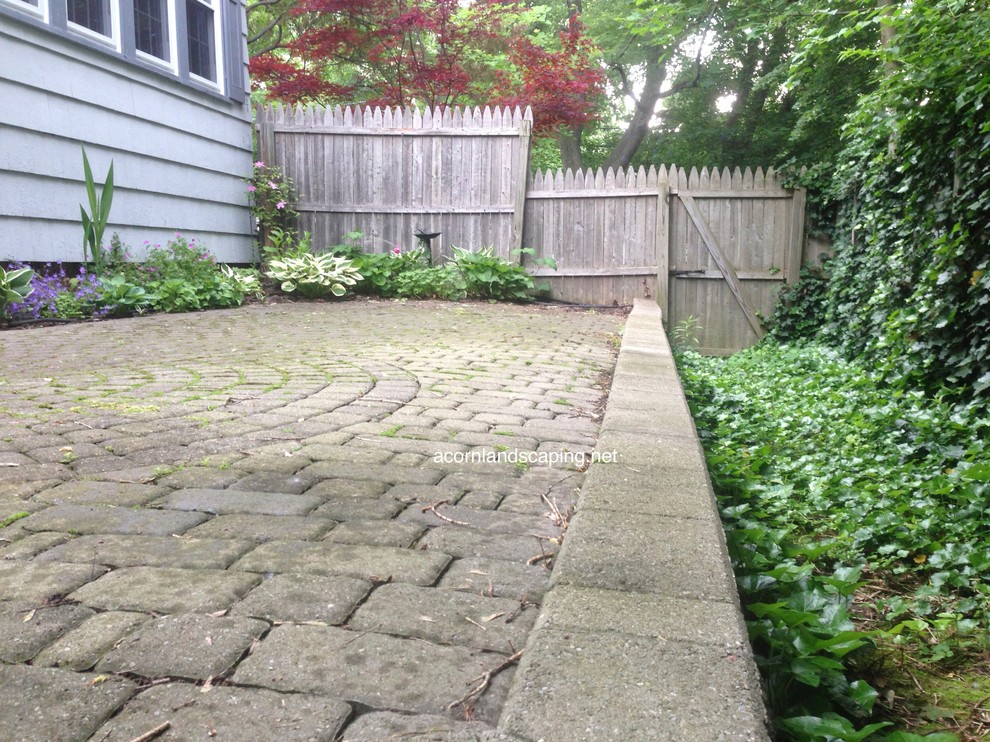 Example of a small classic backyard concrete paver patio design in New York