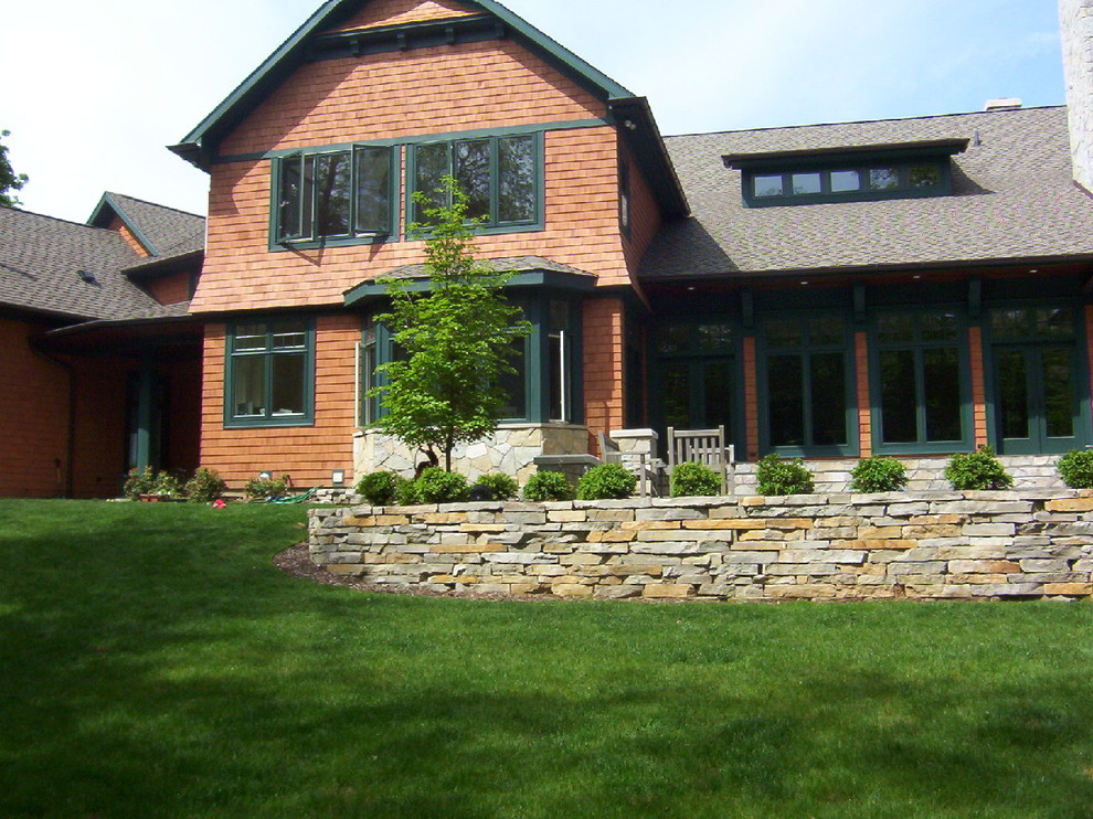 Example of a classic backyard patio design in Grand Rapids