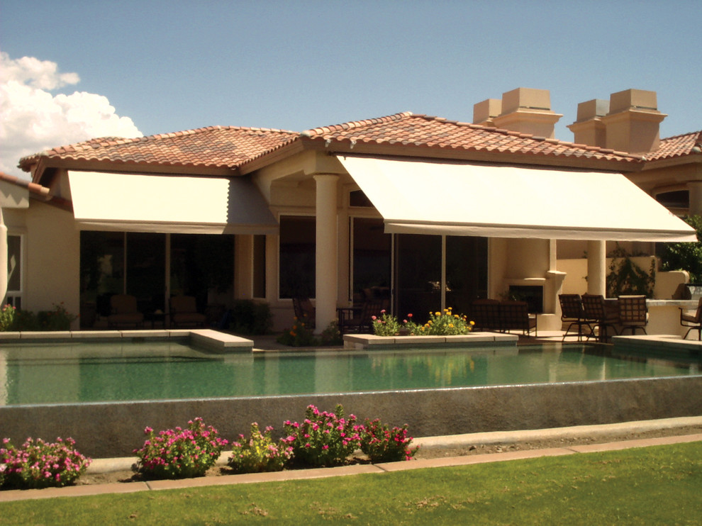 Retractable Awnings Mediterranean Patio Chicago by NuView Custom Window Treatments Inc