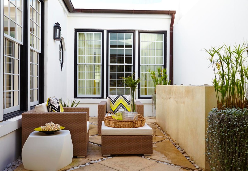 Beach style courtyard patio photo in Atlanta