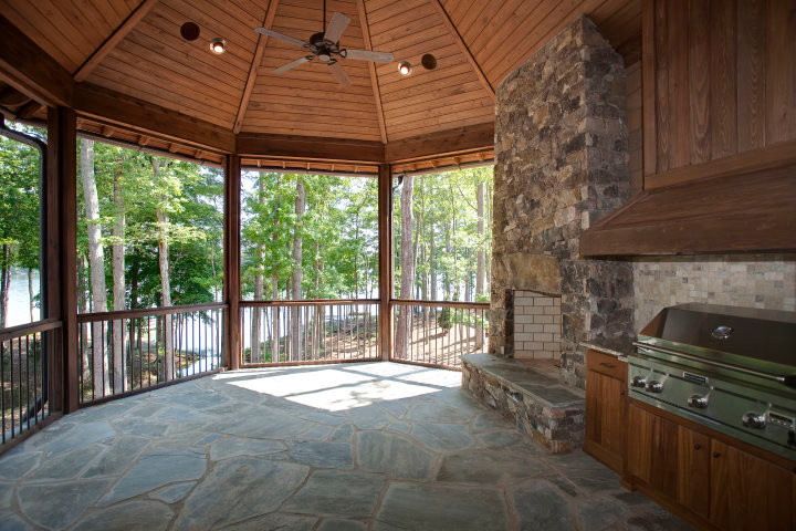 Foto de patio rural grande en patio trasero y anexo de casas con cocina exterior y adoquines de piedra natural