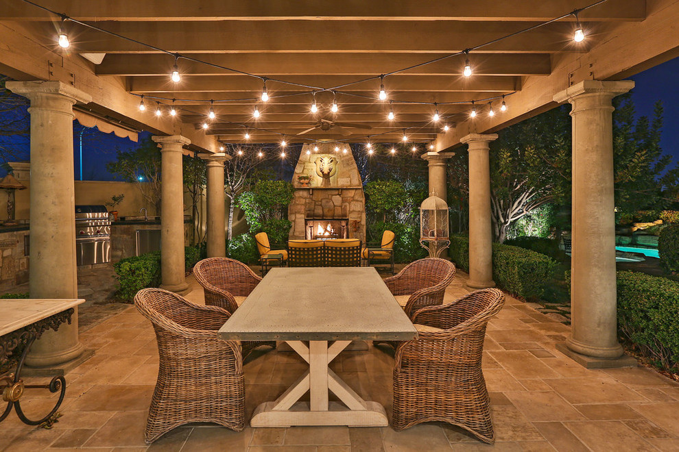 Design ideas for a victorian patio in Santa Barbara with tiled flooring and a pergola.