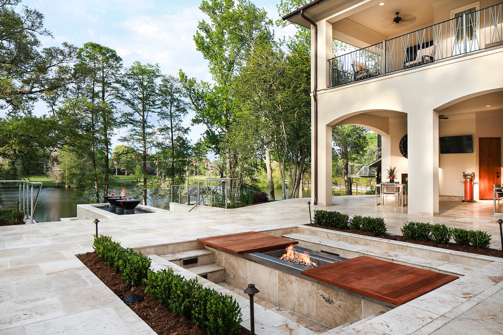 This is an example of a classic patio in Nashville with a fire feature.