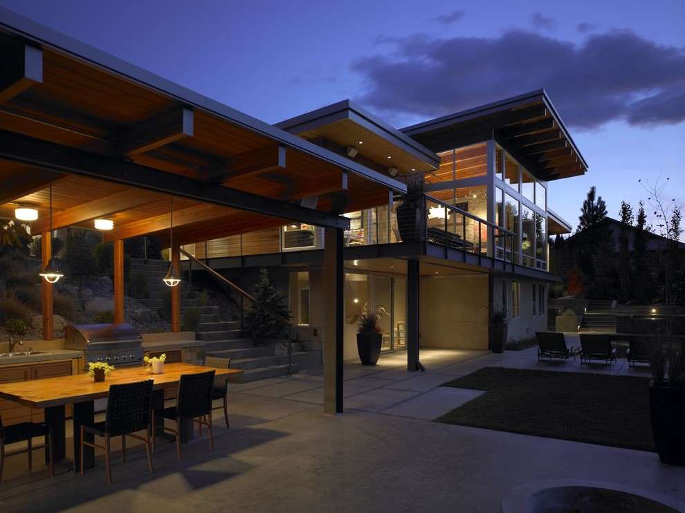 This is an example of a contemporary patio in Seattle with an outdoor kitchen.