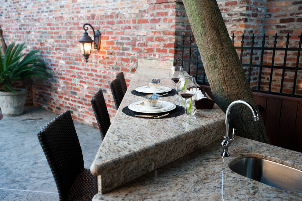 Example of a trendy patio design in New Orleans