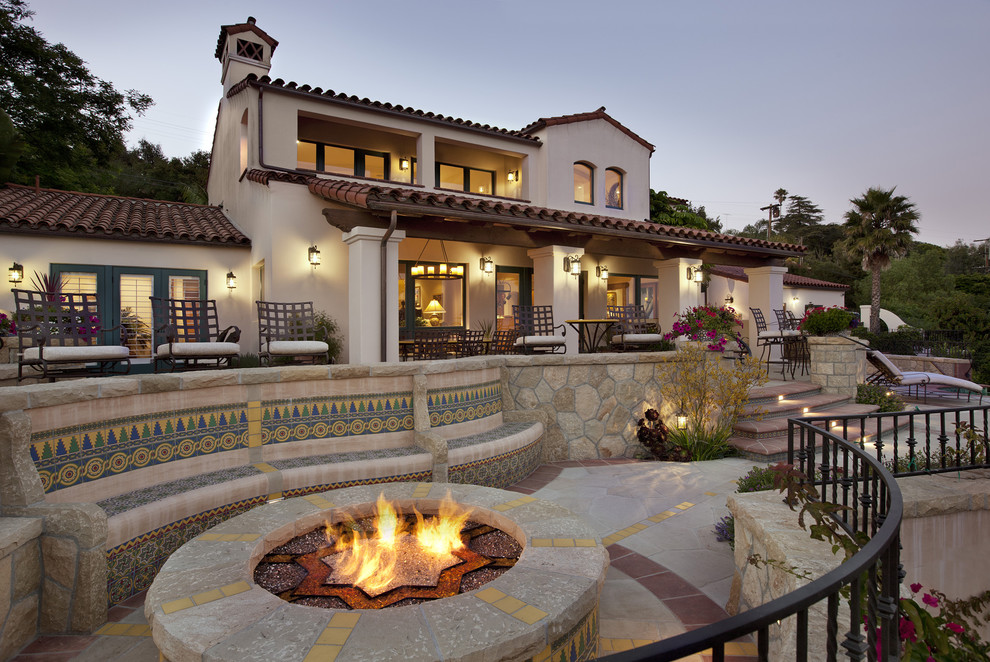 Design ideas for a mediterranean patio in Santa Barbara with a fire feature.