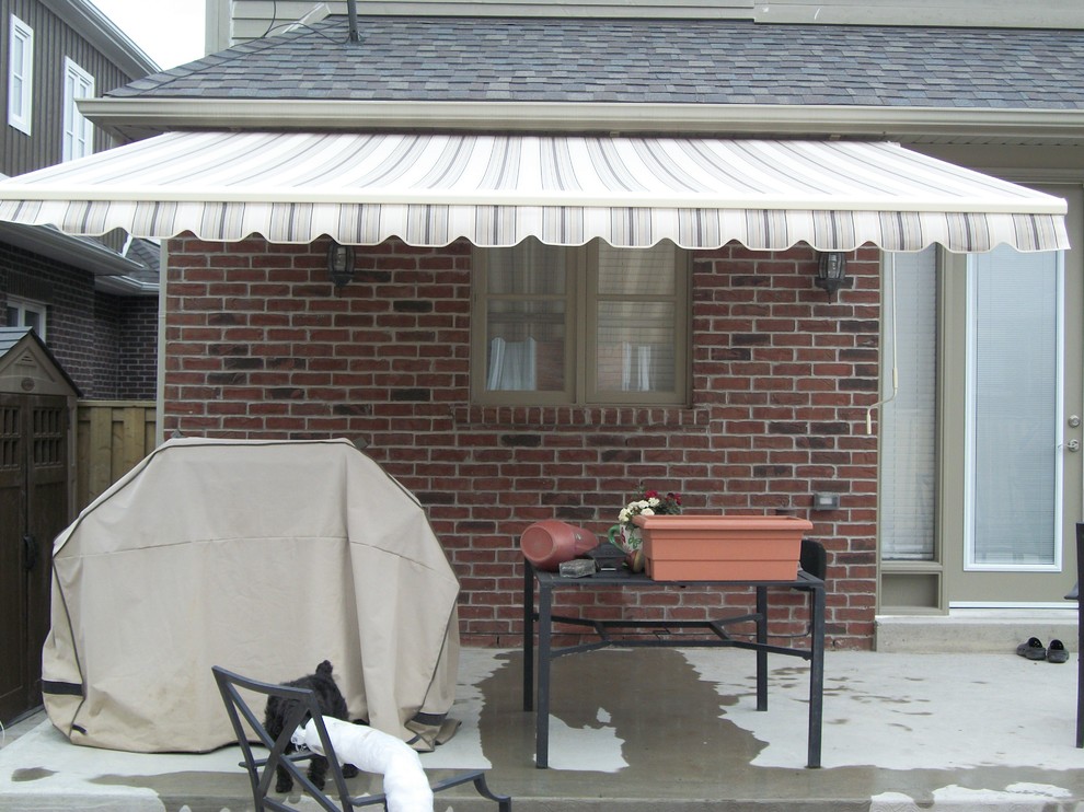 Rolltec Awnings Traditional Patio Calgary by Gateway Sunrooms
