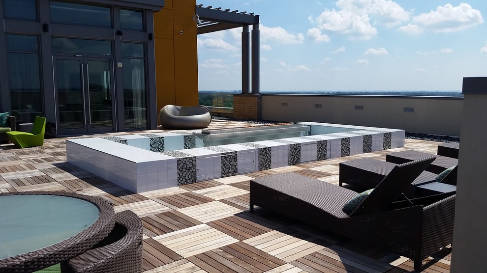 Photo of a contemporary patio in Other with a fire feature.