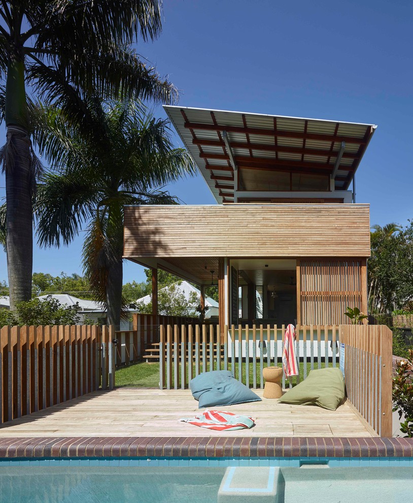 Inspiration for a small contemporary back patio in Brisbane with decking and no cover.
