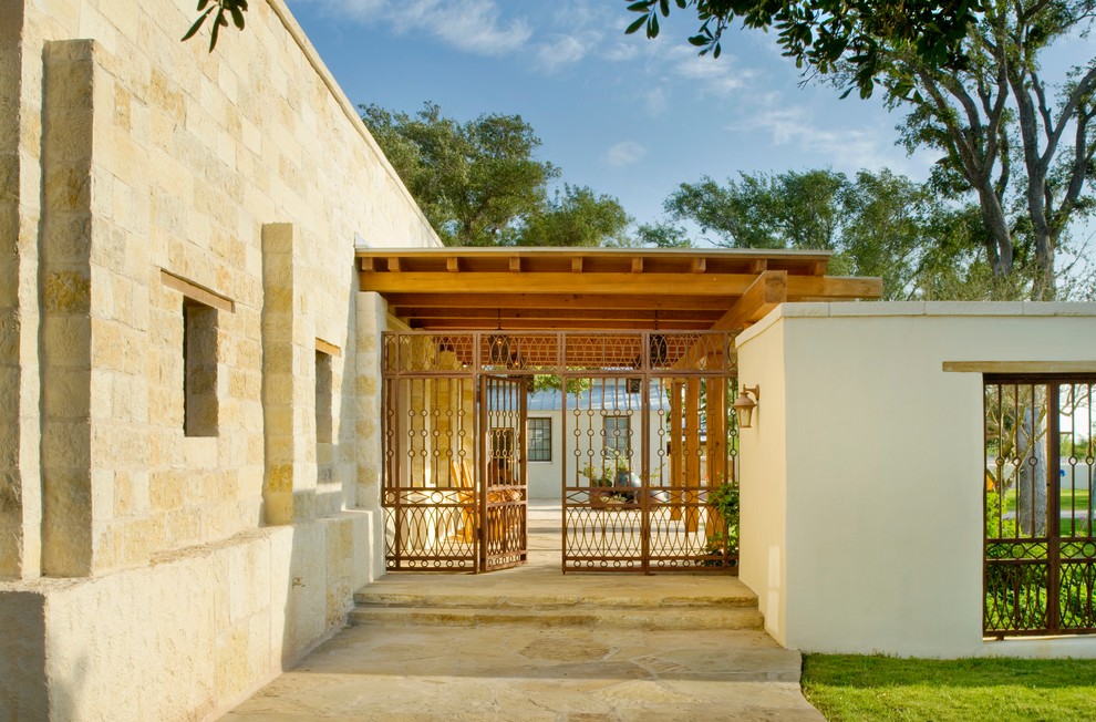 Patio - southwestern patio idea in Houston