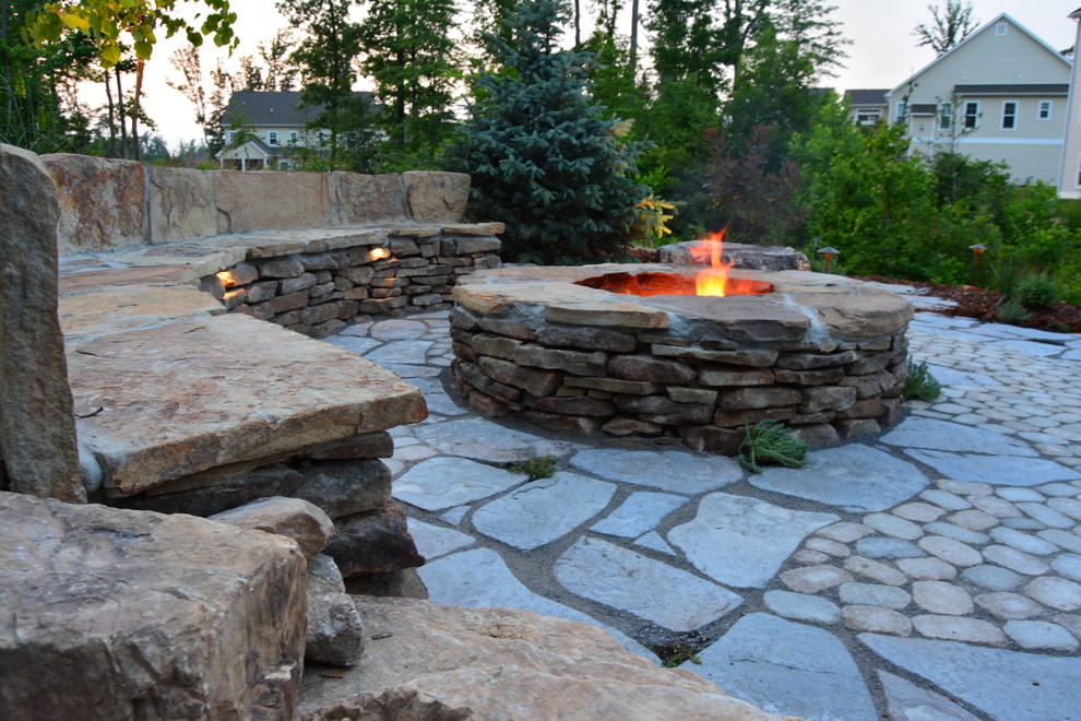 Design ideas for a medium sized rustic back patio in Richmond with a fire feature and concrete paving.