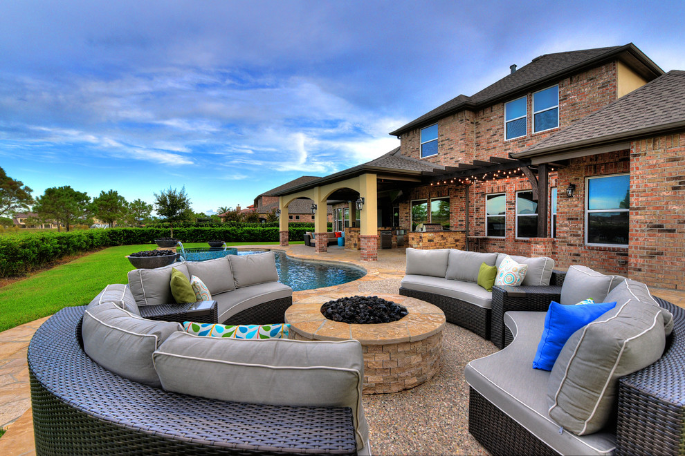 Rustic Swimming Pool with Outdoor living Transitional Patio